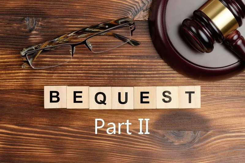 Scrabble tiles on a wood table spelling the word "Bequest", with glasses and a gavel resting above them. "Part II" Is written in text below this.