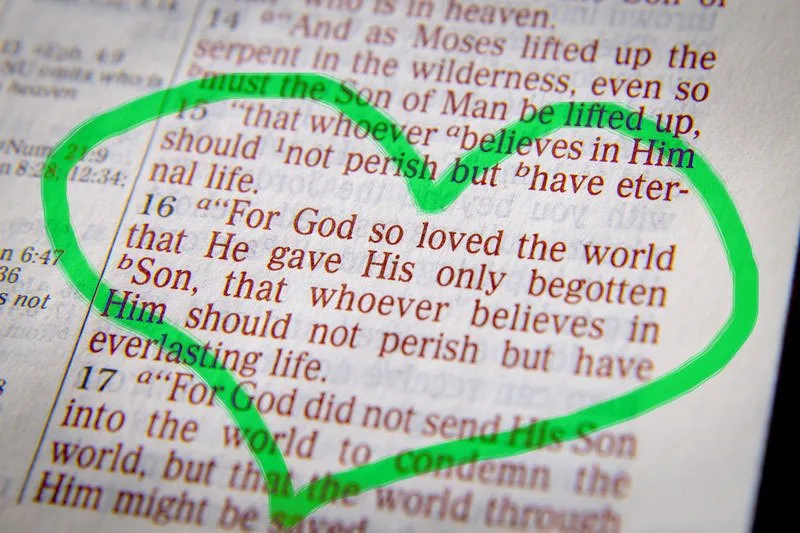 A bible verse highlighted with a drawn green heart around it.