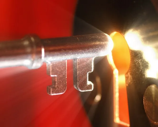 Closeup picture of a key going into a lock