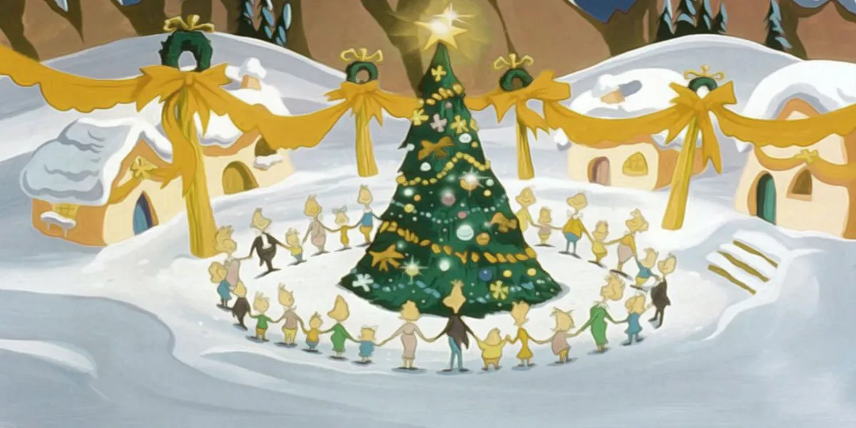 A shot of the Whos from The Grinch Who Stole Christmas, holding hand around a Christmas tree in Whoville.